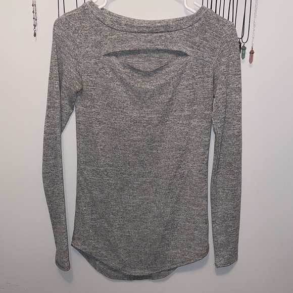 grey long sleeve top with slit, cut-out detail above breast - Picture 3 of 3